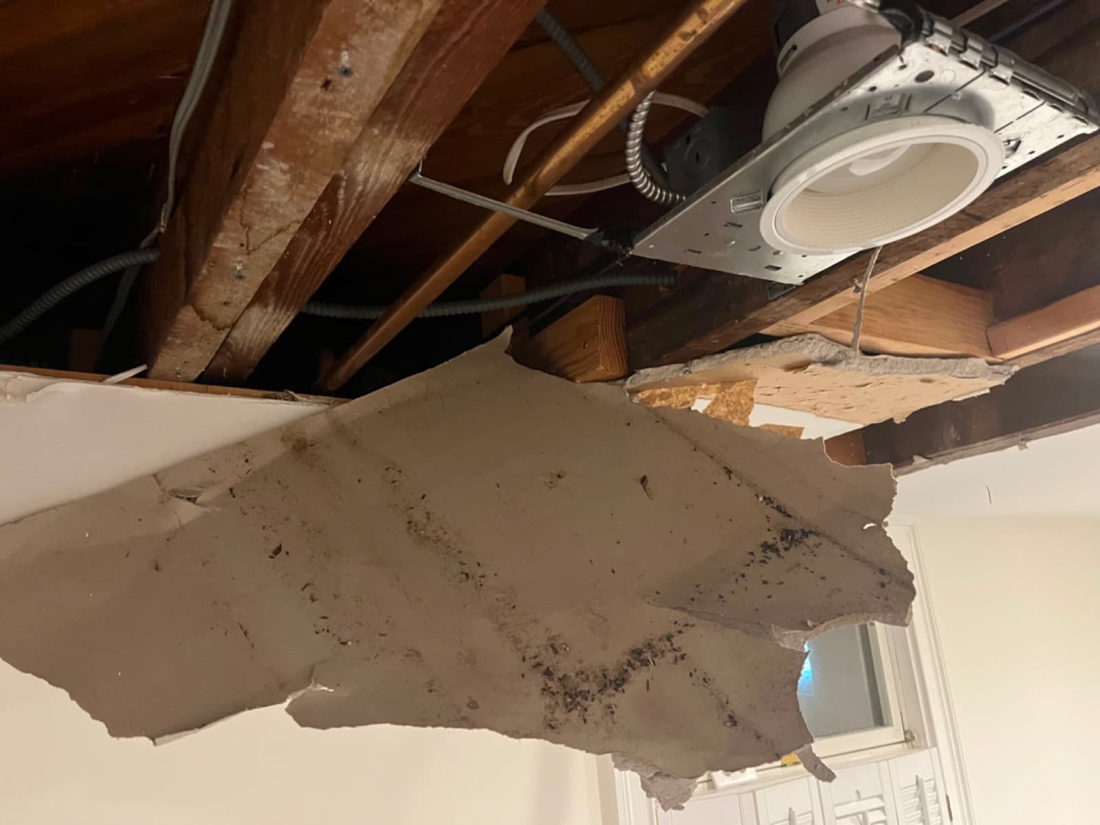 Water stained basement ceiling in Darien, CT before professional drying
