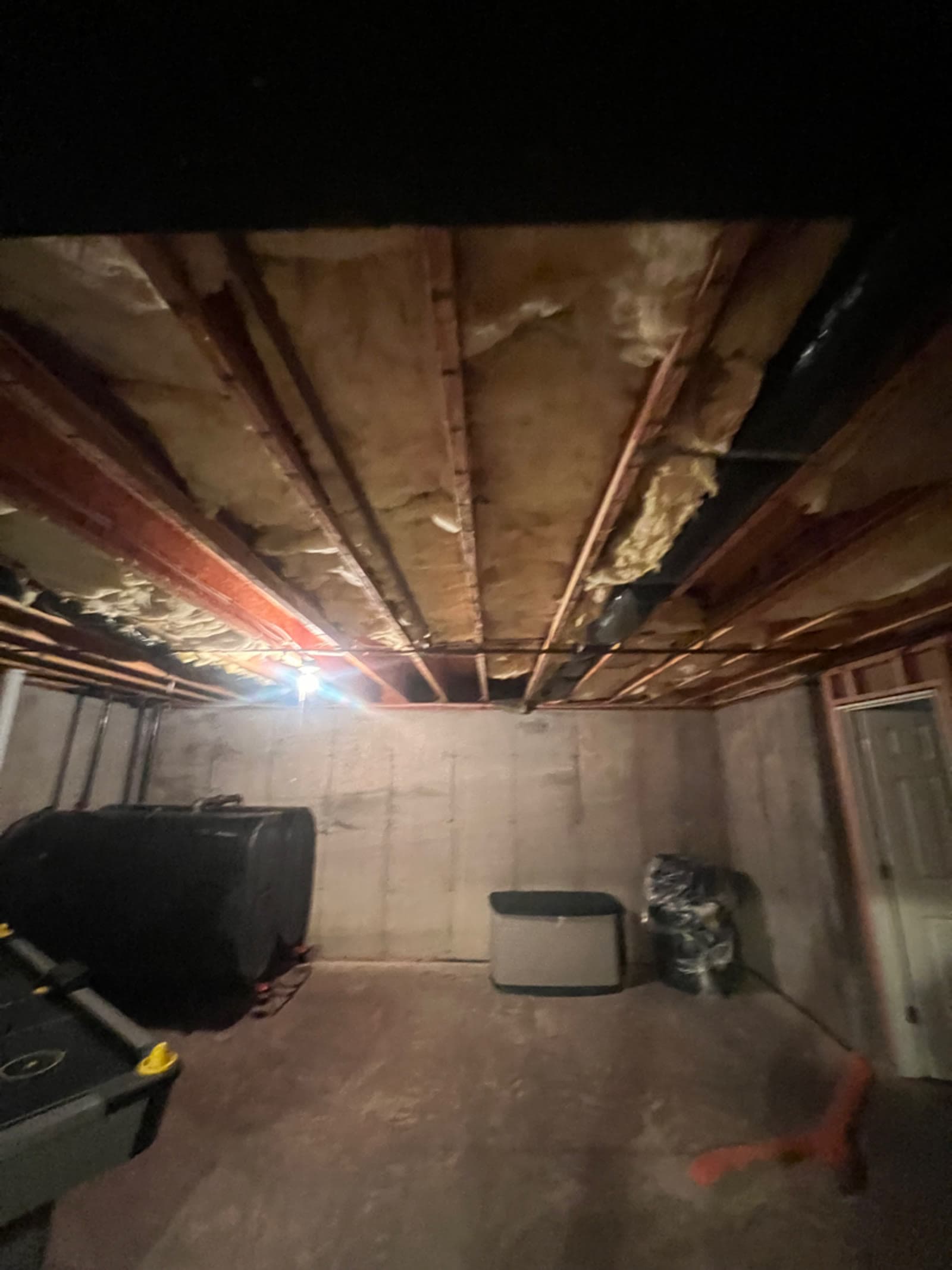 Unfinished basement ceiling and joist system in a Farmington, CT home during whole house mold remediation