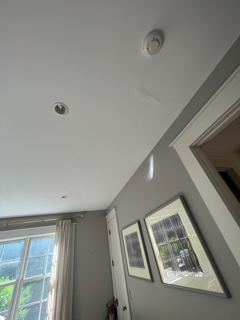 Water-damaged wall opened and dried in a Litchfield, CT home, then restored