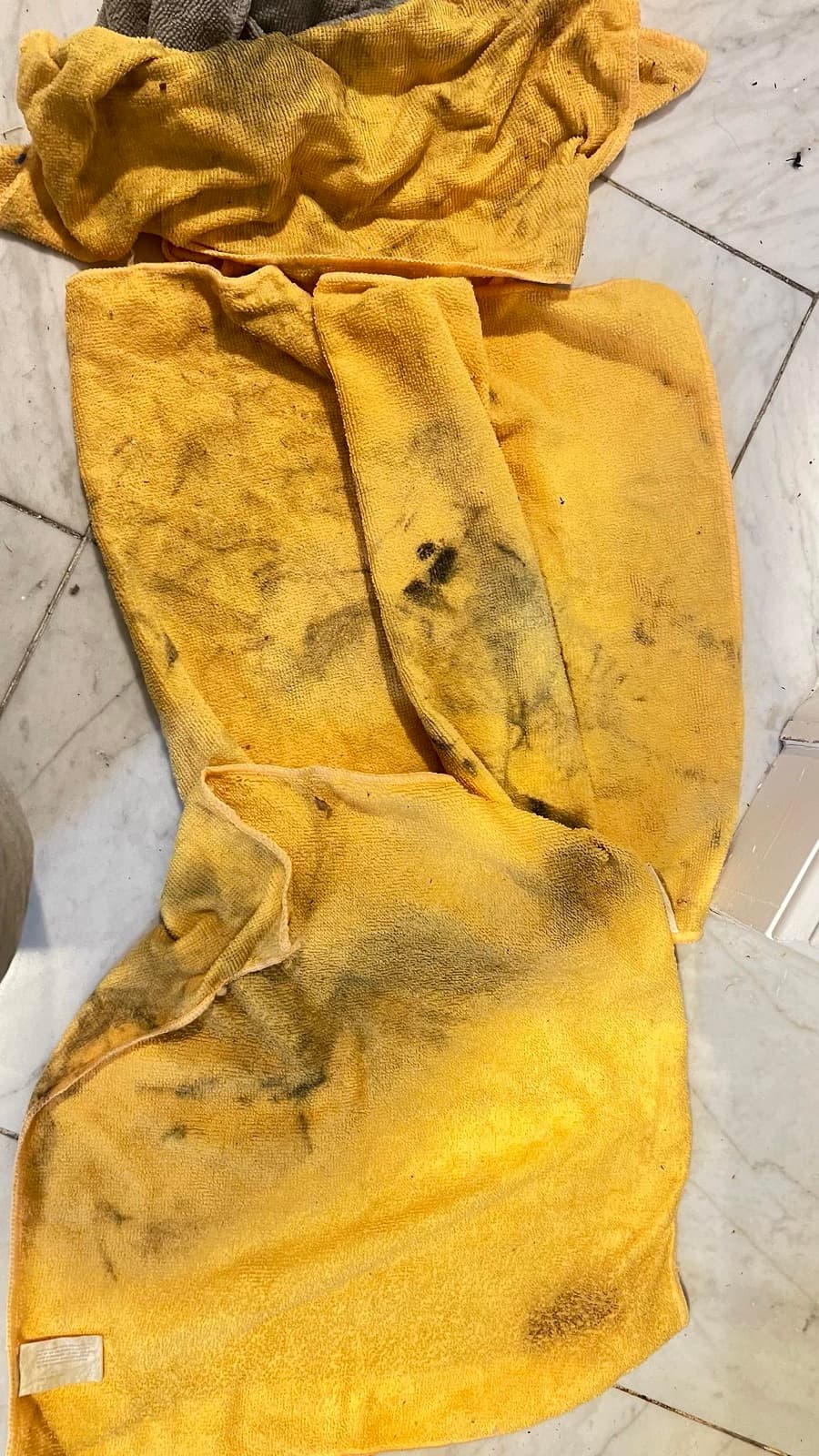 Microfiber cloths blackened with residue lifted off 1,600 square feet of surfaces during an Ossining, NY apartment sanitization cleaning