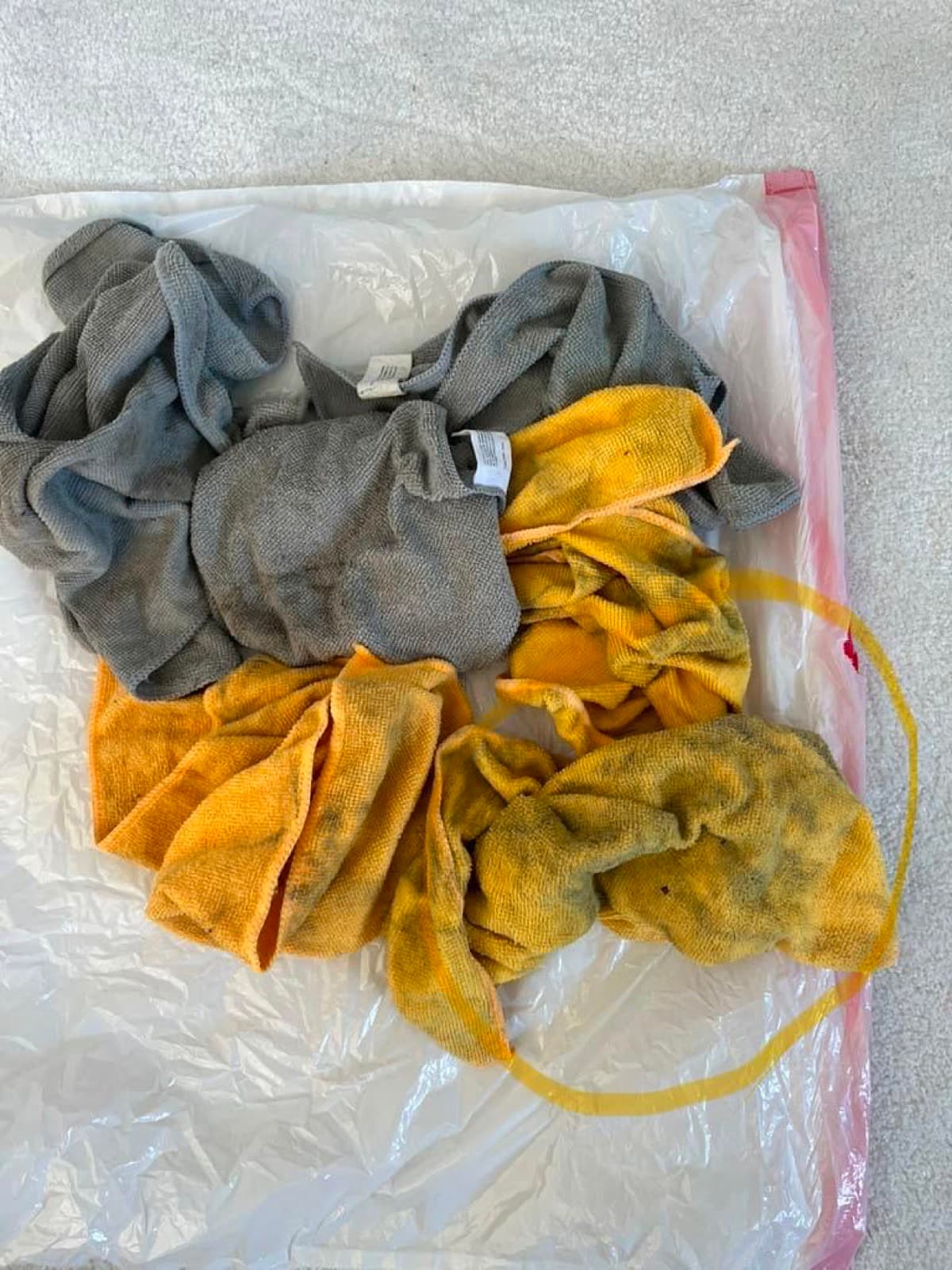 Microfiber cloths blackened with residue lifted off 1,600 square feet of surfaces during an Ossining, NY apartment sanitization cleaning
