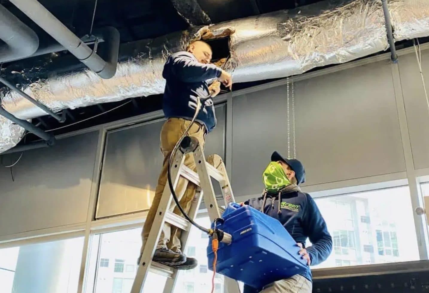Exposed commercial ceiling ductwork in a converted mill building of the type found on Cottage Street in Easthampton MA, cleaned to the ACR-2021 source-removal standard