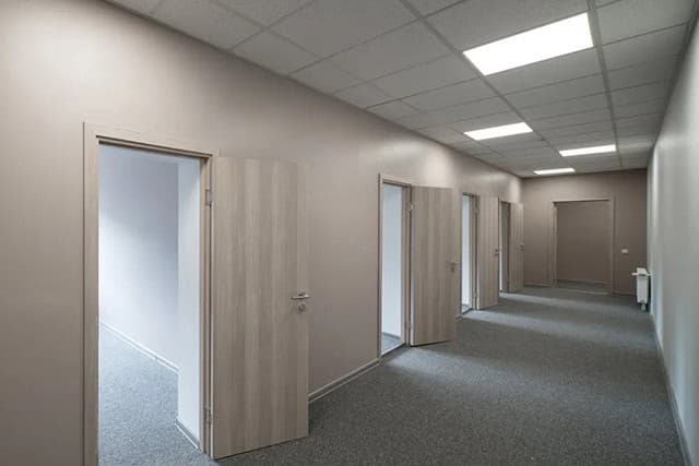 Property manager inspecting a commercial floor for cleaning standards