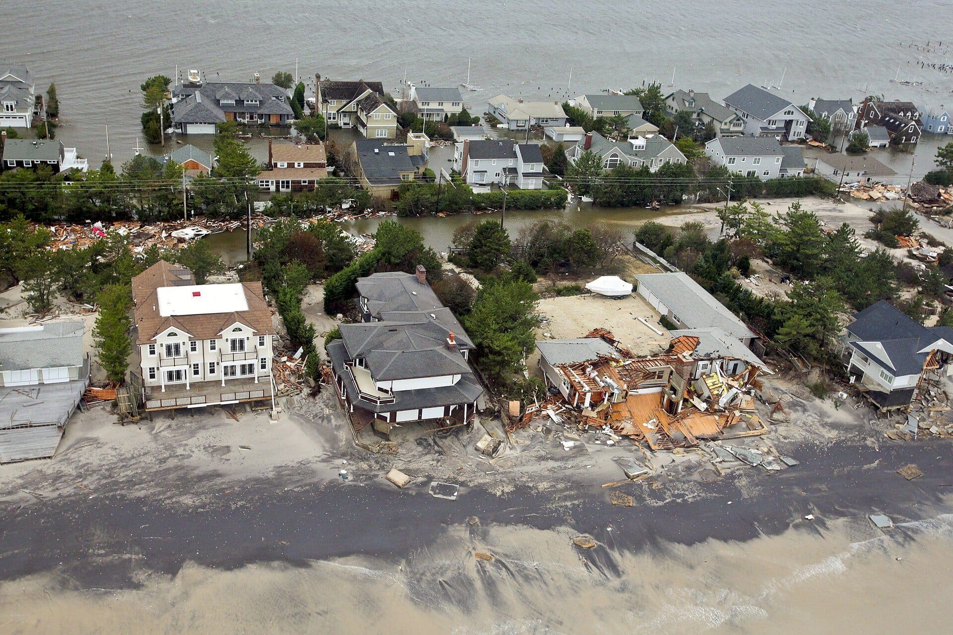 Aerial view of Hurricane Sandy damage to coastal homes, US Army search-and-rescue mission October 30, 2012