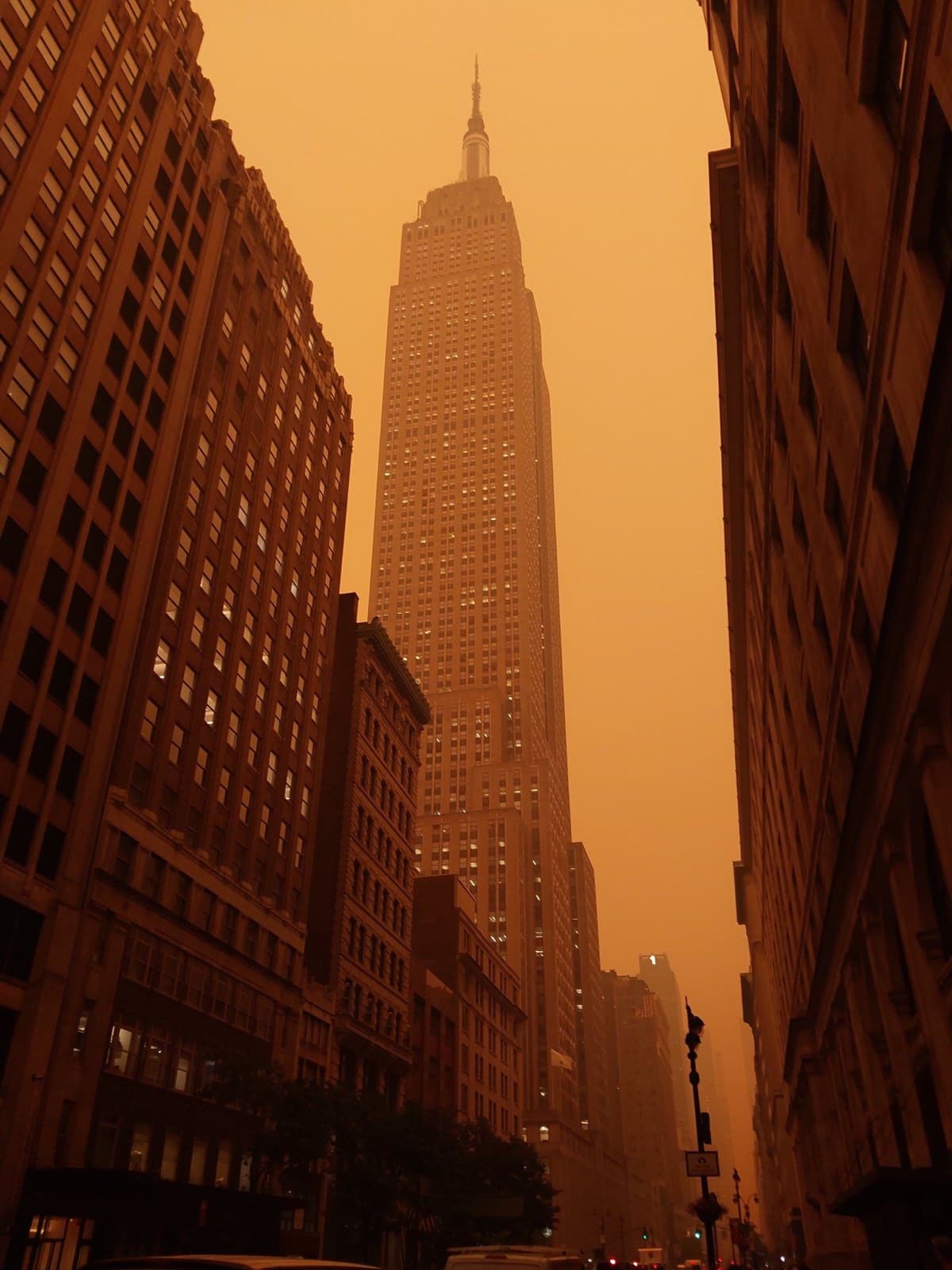Empire State Building shrouded in orange Canadian wildfire smoke over NYC on June 7, 2023