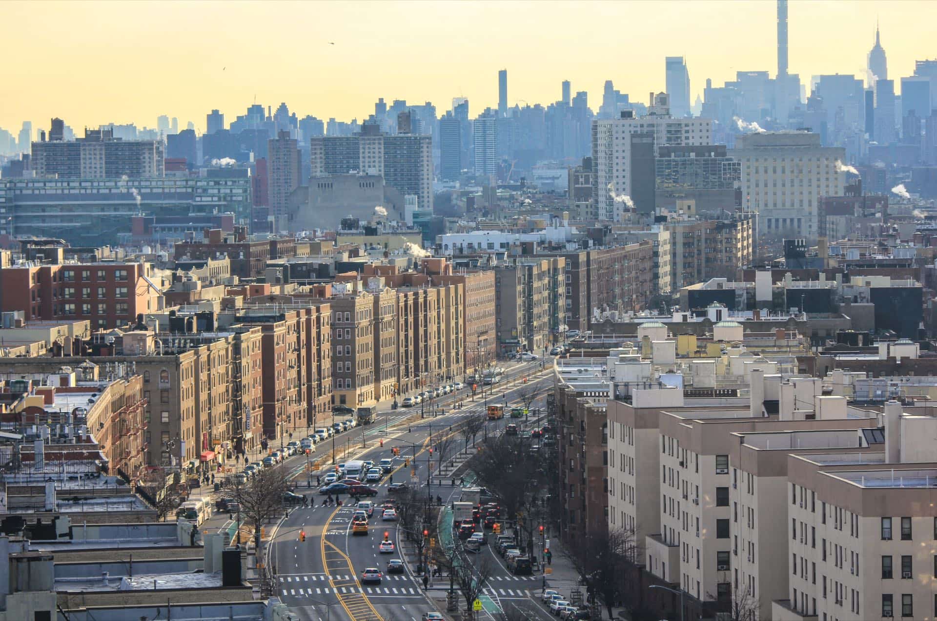 The Grand Concourse in the Bronx, New York lined with pre-war apartment buildings. Green Restoration provides 24/7 water, fire, mold, and storm damage restoration in the Bronx, NY.