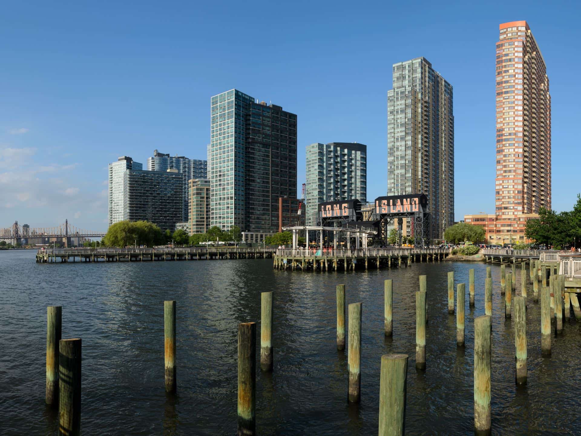 The Long Island City skyline in Queens, New York from Gantry Plaza State Park. Green Restoration provides 24/7 water, fire, mold, and storm damage restoration in Queens, NY.